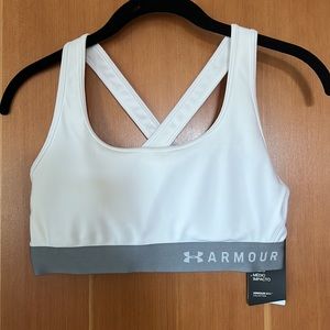 Brand new Under Armour sports bra with removable pads.